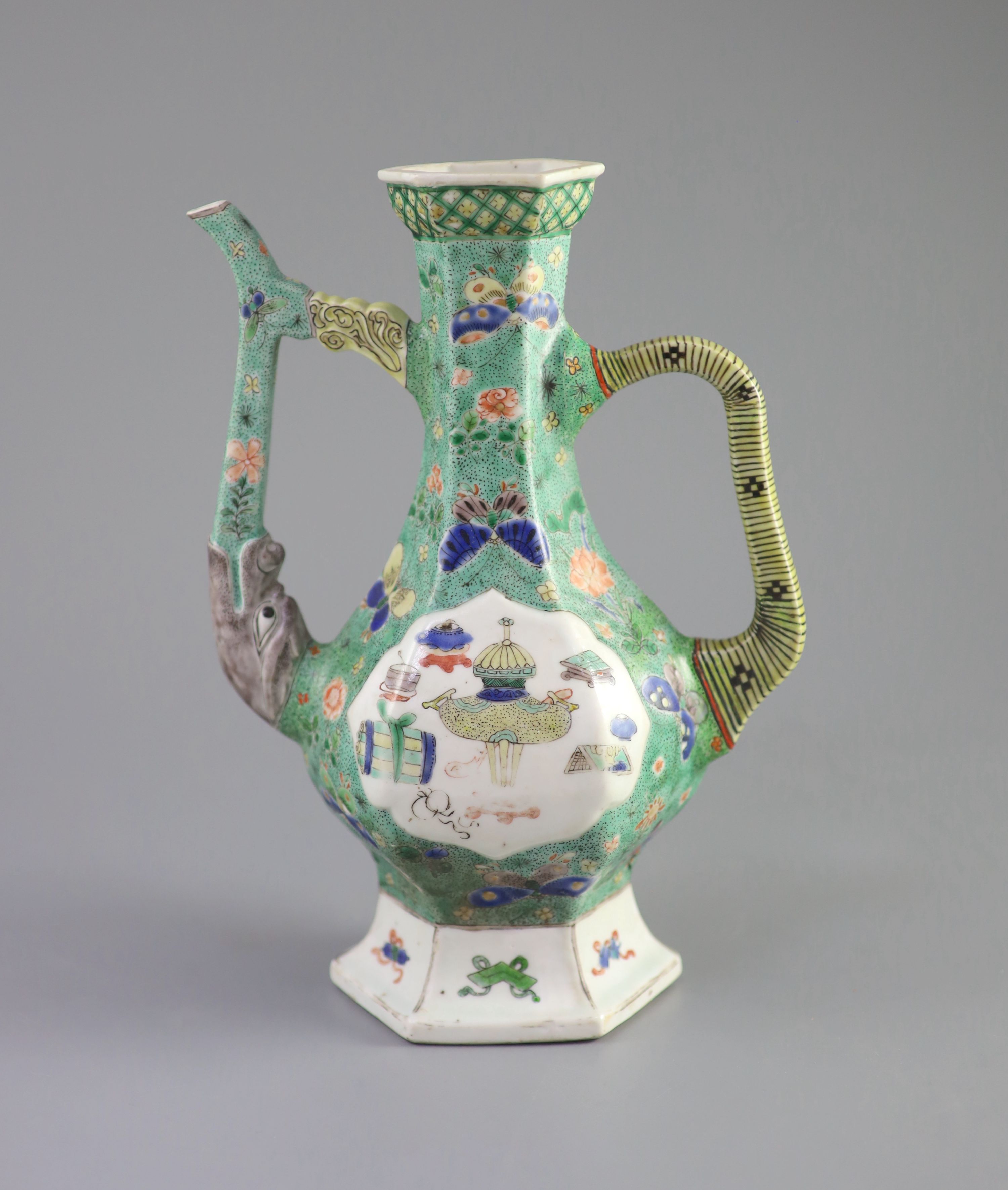 A Chinese famille verte hexagonal wine ewer, Kangxi period (1662-1722), 26cm high, restorations